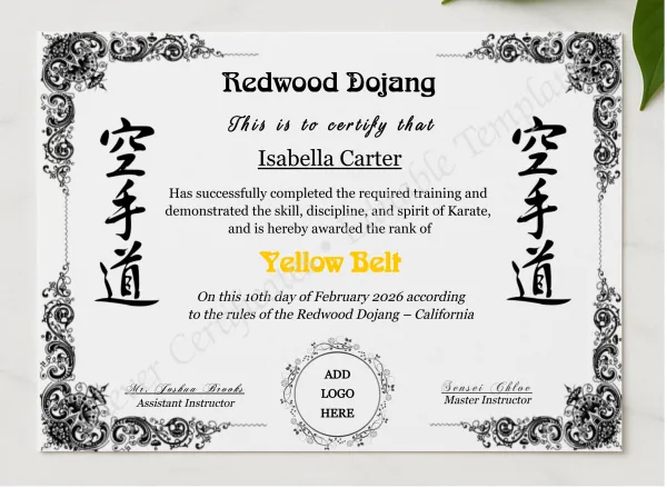 Karate Yellow Belt Certificate With Logo presented in a sleek wooden frame, elegantly arranged on a stylish table.