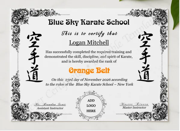 Karate Orange Belt Certificate With Logo presented in a sleek wooden frame, elegantly arranged on a stylish table.
