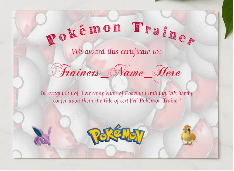 Pokemon Trainer Certificate 2 presented in a sleek wooden frame, elegantly arranged on a stylish table.