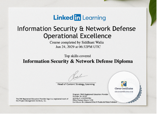 Information Security And Network Defense Diploma presented in a sleek wooden frame, elegantly arranged on a stylish table.