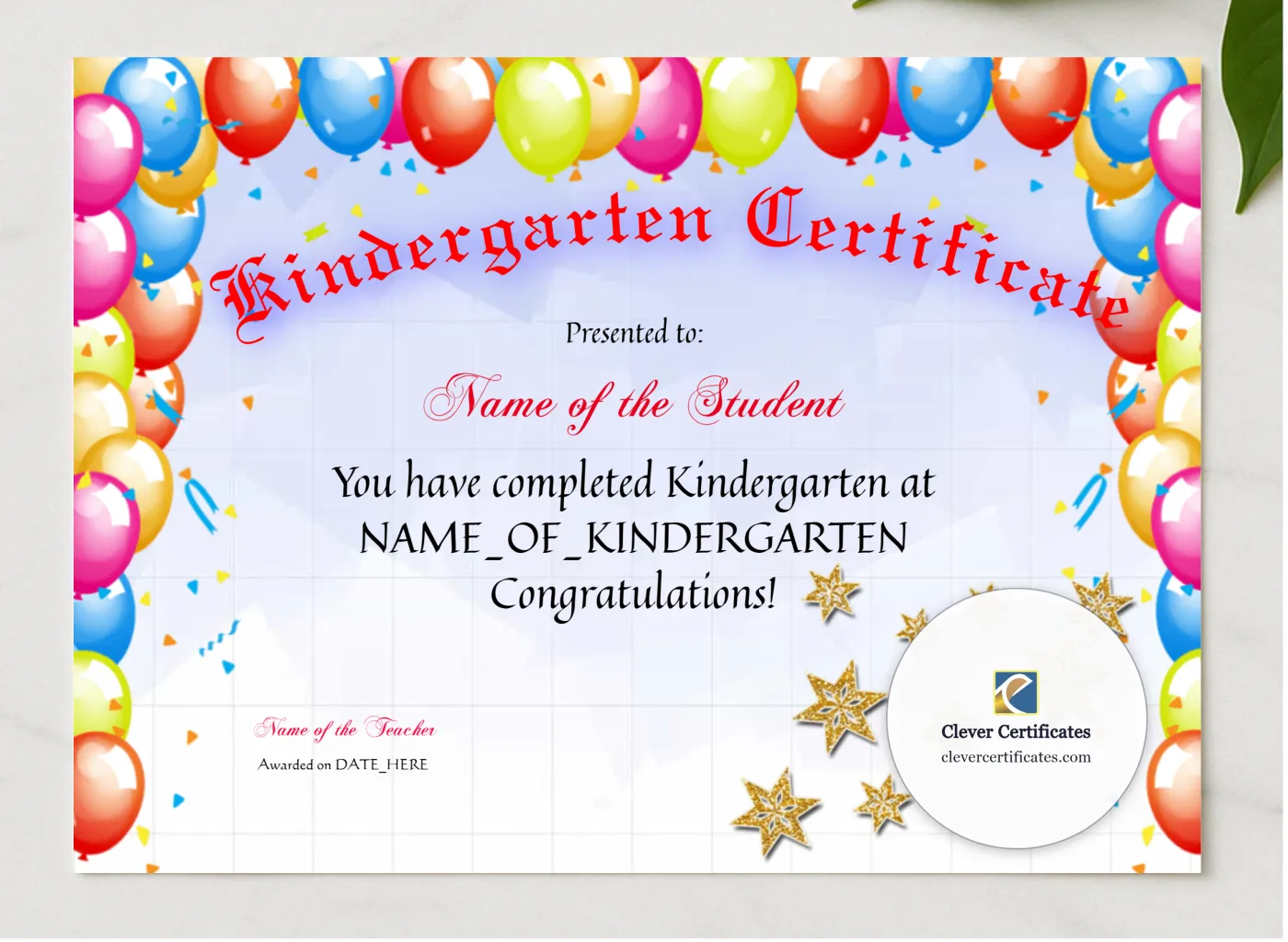 Kindergarten Balloons Certificate presented in a sleek wooden frame, elegantly arranged on a stylish table.