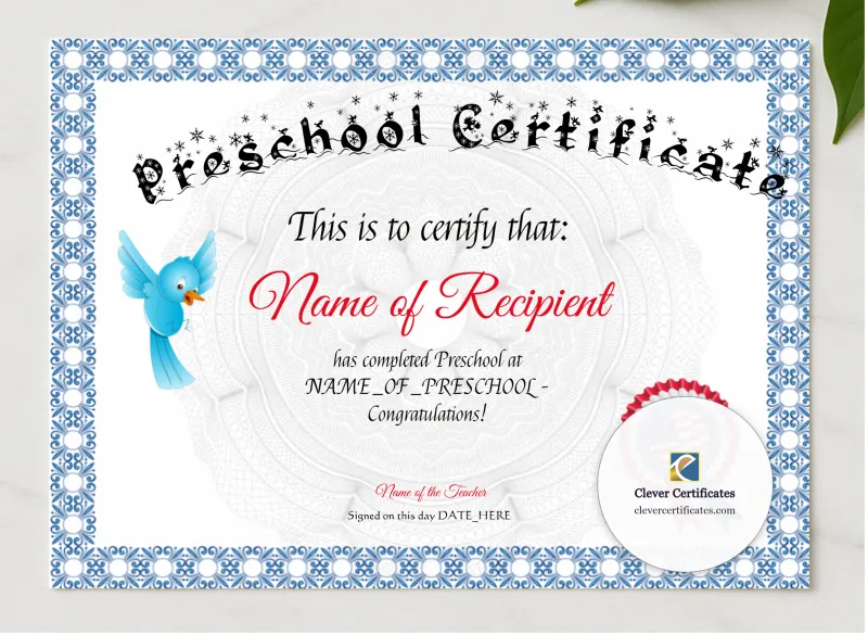 Preschool Bluebird Certificate presented in a sleek wooden frame, elegantly arranged on a stylish table.