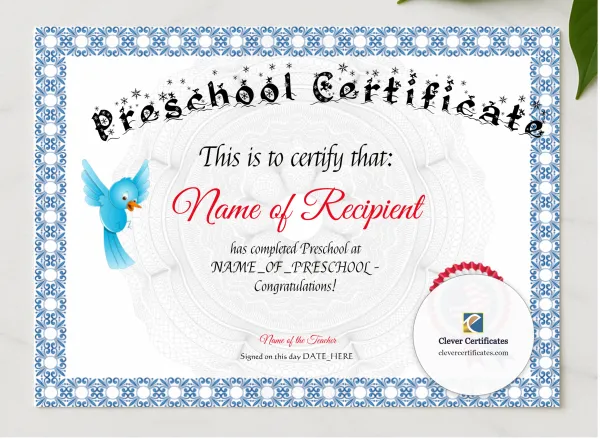 Preschool Bluebird Certificate presented in a sleek wooden frame, elegantly arranged on a stylish table.
