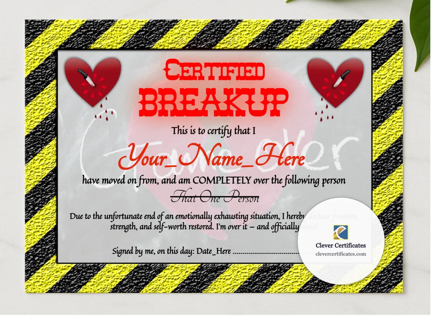 Breakup Certificate presented in a sleek wooden frame, elegantly arranged on a stylish table.