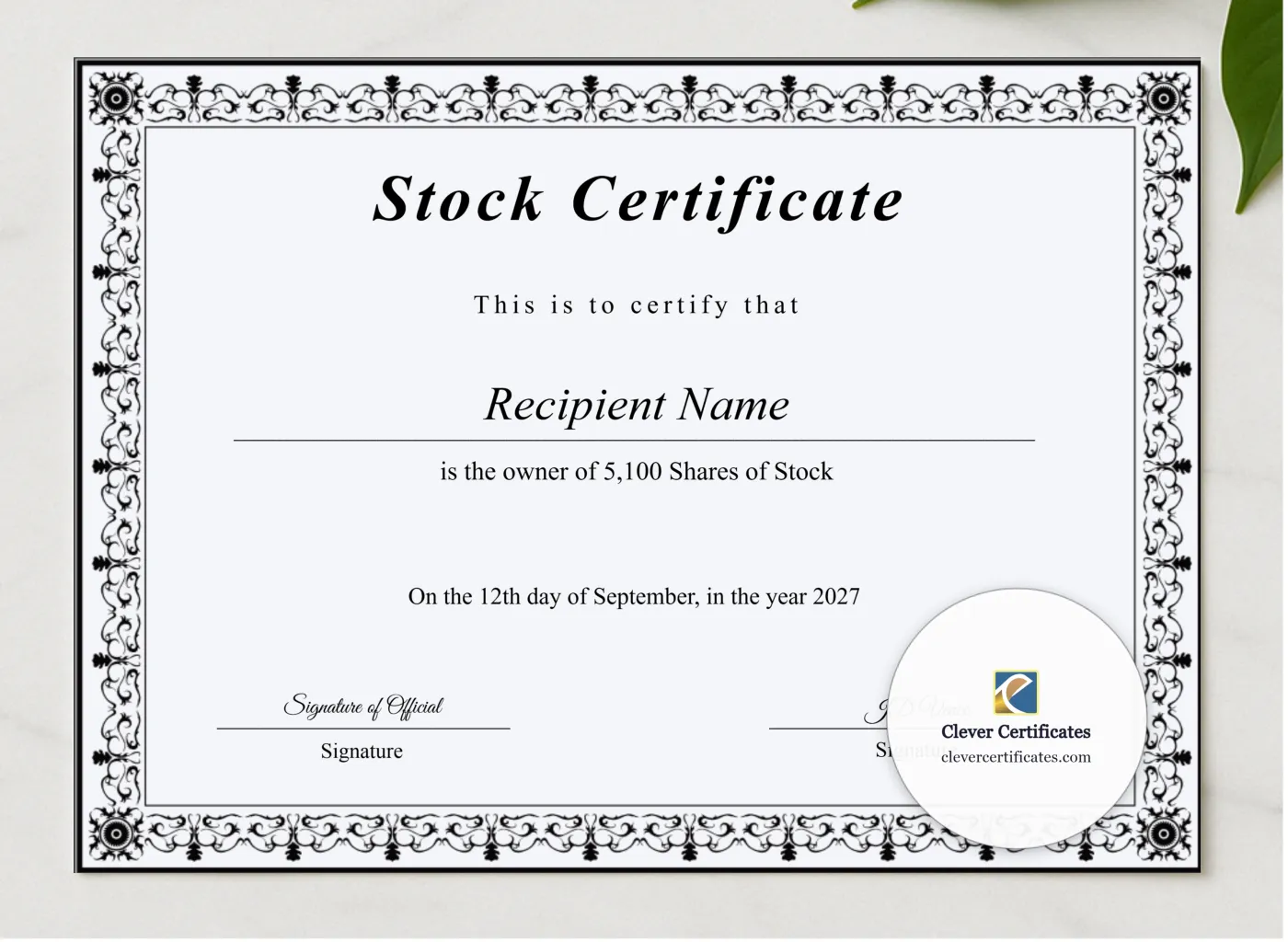 Editable Stock Certificate presented in a sleek wooden frame, elegantly arranged on a stylish table.