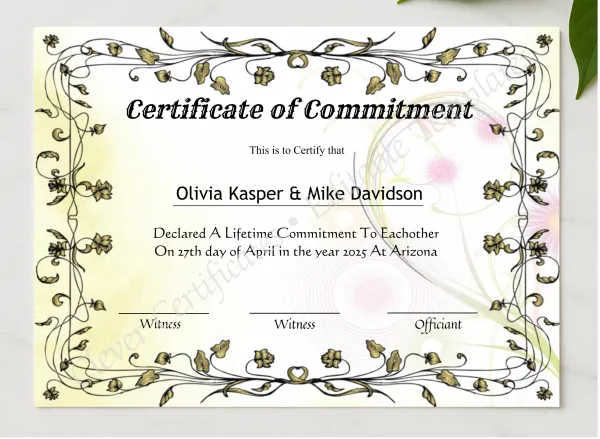 Editable Certificate Of Commitment presented in a sleek wooden frame, elegantly arranged on a stylish table.