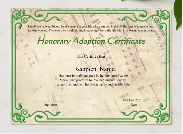 Editable Honorary Adoption Certificate presented in a sleek wooden frame, elegantly arranged on a stylish table.