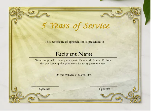 5 Years Of Service Anniversary Award Certificate presented in a sleek wooden frame, elegantly arranged on a stylish table.