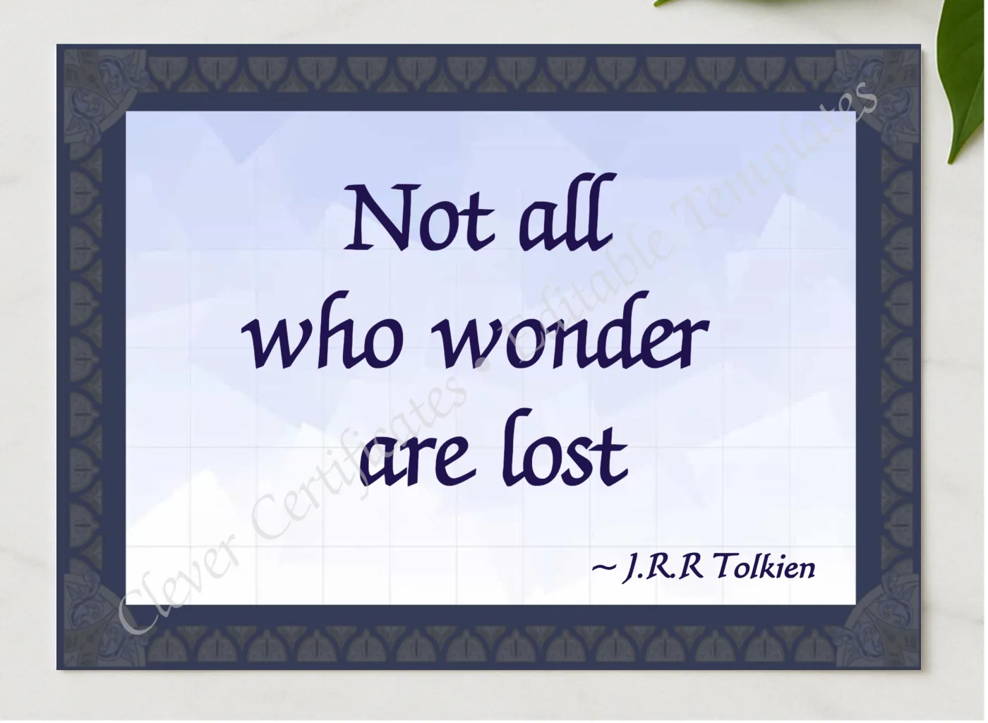 J R R Tolkien Quotation presented in a sleek wooden frame, elegantly arranged on a stylish table.
